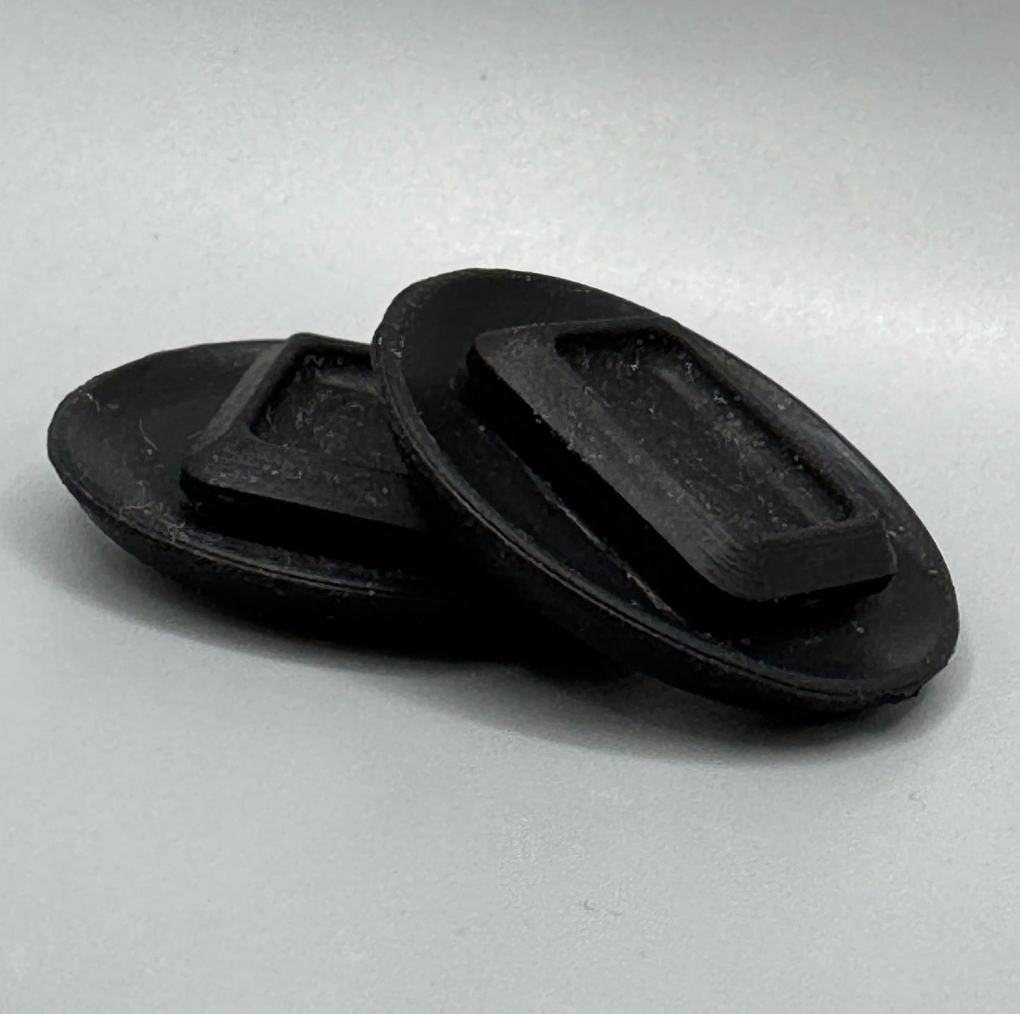 NA Miata firewall throttle cable hole plug – black rubber
